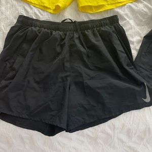 Used only 1-2 times each, these men’s running Nike shorts with pockets. No flaws